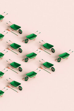 a triangle from green rake and wheelbarrows