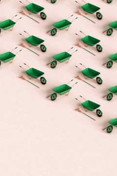 collection of green rake and wheelbarrows