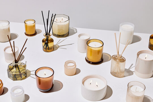 Set of candles and reed diffusers