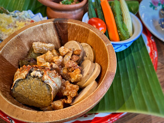 The Northern Thai Cuisine set, include fried pork skin, northern style pork sausage and Phu Ong, it made from a grilled patty crab filled with meat of rice field crab mix with salt and egg