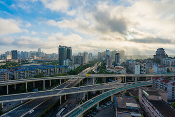 Fototapeta na wymiar Nanning city skyline, Guangxi, Qingzhu interchange and Yongzhou Pavilion at sunrise