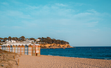 Famous beach huts in Sagaro with Playa de Sant Pol, Costa Brava. Spain. Mediterranean Sea