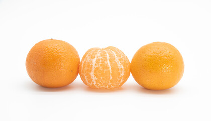 whole and slice Tangerine or kamala over on white background,