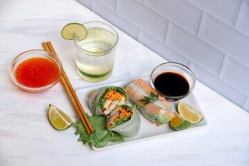 Fototapeta na wymiar Rice paper Vietnam spring rolls with vegetables