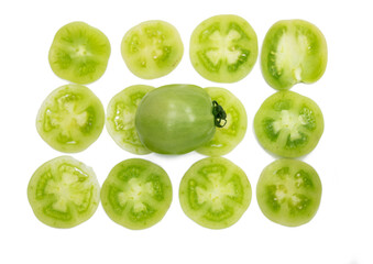 Green tomatoes slice isolated on white background.