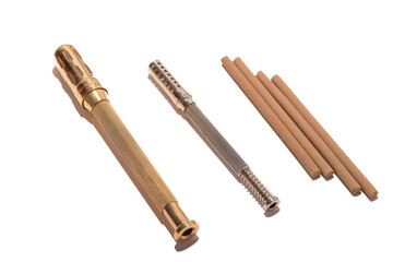 Alternative therapist applying moxibustion a traditional chinese medicine method. Doctor healing young patient with traditional asian medicine. Moxa stick alone. Extreme close up. Moxibustion.