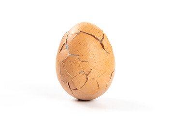 close up of broken egg isolated on white background