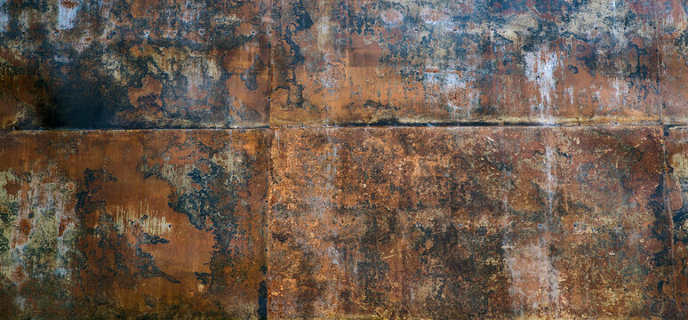 Texture of rusty metal sheets welded together by welding. © baxys