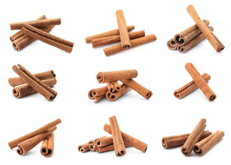 Set with aromatic cinnamon sticks on white background