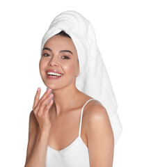 Beautiful young woman with towel on head against white background