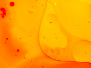 Abstract yellow, orange water bubbles background. .Full frame of the textures formed by the bubbles...