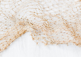 Sea mood art photo of a fishing net.