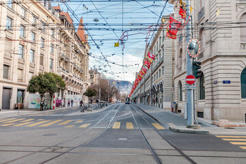 GENEVA, SWITZERLAND - February 20, 2022: Geneva street scene. Bel Air. trams, buses, trolleybuses...