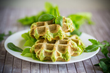 vegetable waffles cooked with herbs in a plate