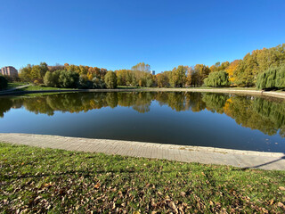 park in autumn at dry sunny fall day