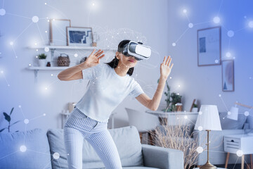 Woman with VR glasses using application of smart home automation in room