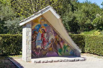 A Photograph of the mosaic art of the baptism of Jesus, in Medjugorje.
