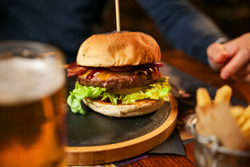 tasty beef sandwich in black background