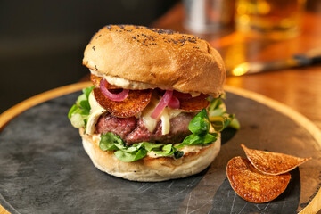 tasty beef sandwich in black background