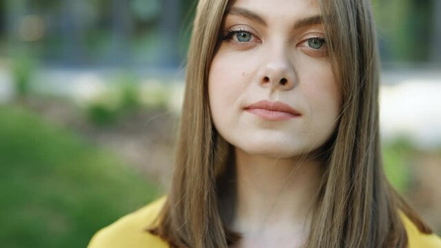 Close-up portrait of nice-looking caucasian multi-race beautiful businessperson elegant young woman looking into camera. Career people. Fashion, beauty. Female portraits in 4k uhd.