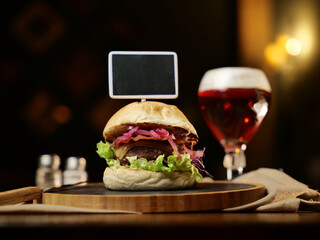tasty beef sandwich in black background