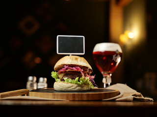 tasty beef sandwich in black background