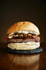 tasty beef sandwich in black background