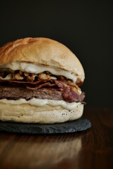 tasty beef sandwich in black background
