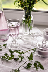 Breakfast of the rich: rosé sparkling wine and flowers.