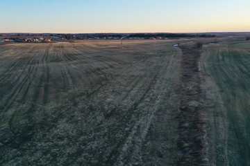 early spring field top view drone, abstract landscape flight