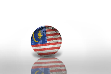 bitcoin with the national flag of malaysia on the white background. bitcoin mining concept.