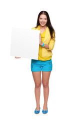 Happy girl holding empty whiteboard isolated on white