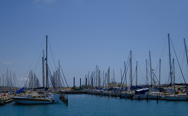 Naklejka na ściany i meble Marina. Yachts and boats at the parking lot by the sea