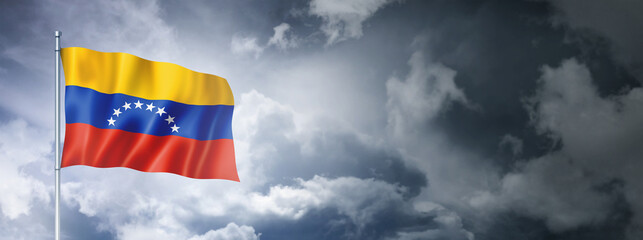 Venezuelan flag on a cloudy sky