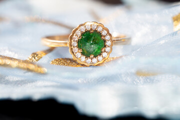Gold ring with natural emerald