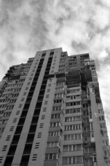 Fototapeta premium The air conditioner pulled an Ukrainian anti-aircraft missile in Kiev at February 25, 2022. The consequences of the explosion are visible in residential building. Ukraine