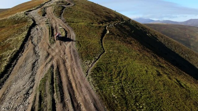 aerial view of trail road to the top of carpathian mountains