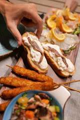 aperitif with aperol crisps on a table