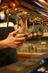 cold beer in a pub spilling spill barman 