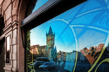 Reflection of Church of Our Lady before Tyn in a shop window on Old Town Square in Prague, Czech Republic