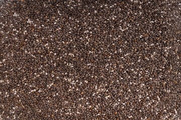 Chia seeds close up. Selective focus. abstract background