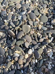 Natural textured background with sea pebbles