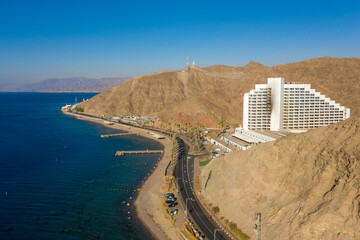 EILAT, ISRAEL - AUG 19 2020 : Top view of  Isrotel Princess Hotel, abandoned  legacy hotel Beach in...