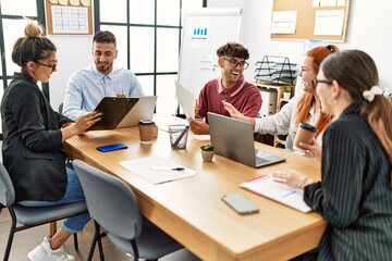 Group of business workers smiling happy working at the office