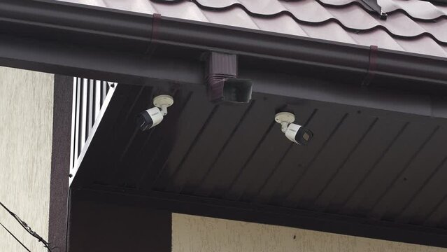 video surveillance camera installed on the roof of a private house