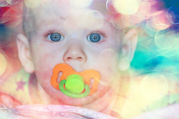 Fototapeta na wymiar baby newborn with pacifier cute baby