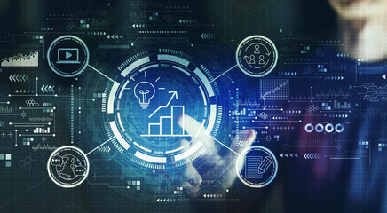 Content marketing concept with young man touching a digital screen at night