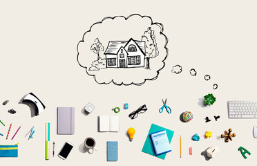 Dreaming of new home with collection of electronic gadgets and office supplies