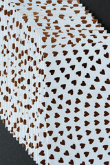 abstract background with small metal foil hearts