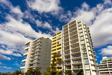 Residential high rise apartment building in inner Sydney suburb NSW Australia. Residential complex in leafy suburbia. Urban living high density suburban city 